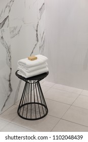 Towels On Stool In Bathroom