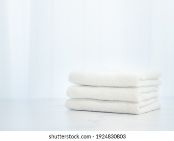 Towels washed and folded in the room. An image of housework and lifestyle.