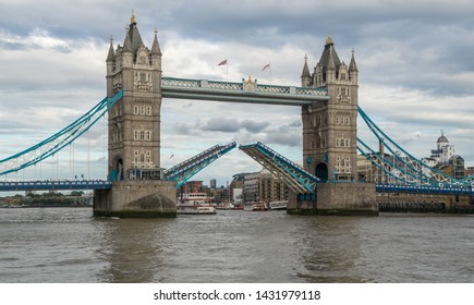 Tower Bridge With The Drawbridge Open On The River Thames