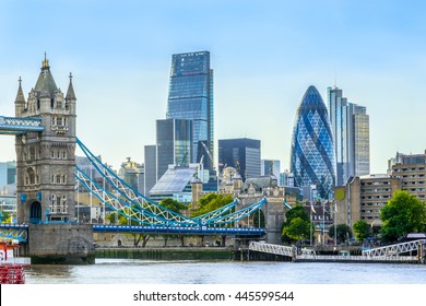 Tower Bridge And Financial District Of London With A Cloudless Sky At Sunset