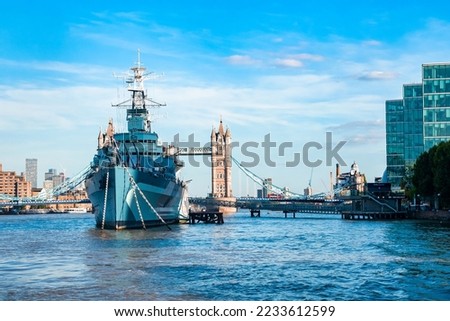Tower Bridge and HMS Belfast on a summer day  in London, England