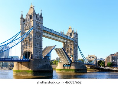 Tower Bridge In London With Drawbridge Open On A Cloudless Day