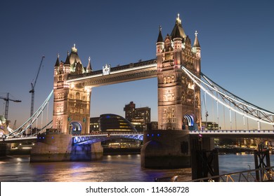 The Tower bridge in London illuminated at night