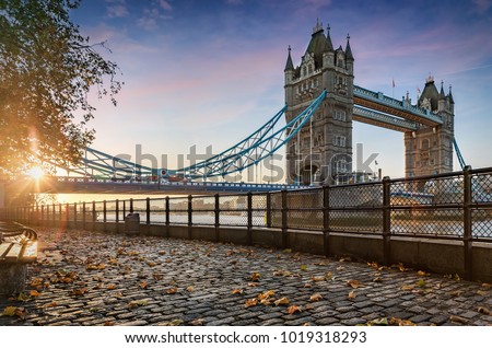 The Tower Bridge in London, United Kingdom, during a golden sunrise
