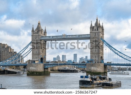 Tower Bridge Over the River Thames with London’s Modern Skyline in the Background – Iconic Historical Landmark Blending Tradition and Innovation in the Heart of London