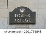 Tower Bridge sign on the wall. The Tower Bridge is a suspension bridge with a total length of 244 metres. London. UK.