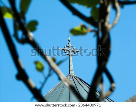 Tower church cross on blue sky