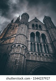 Tower Church Dark Clouds In Brugge Belgium