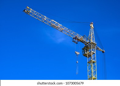 Tower Crane Against The Blue Sky