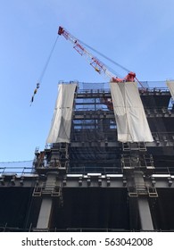 Tower crane at the construction of a building