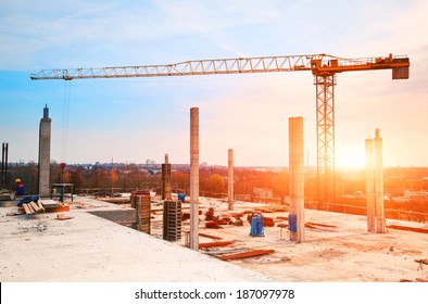 Tower Crane At Construction Site In Morning Sunlight