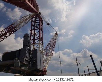 The tower crane installation process using a mobile crane to lift the installation.7