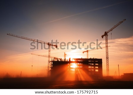 tower cranes at construction site