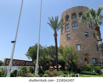 Tower and entrance sign to Puerto Banus marina. Marbella, Spain, May 14th 2022