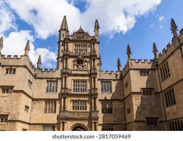 The Tower of the Five Orders, main gatehouse of the Bodleian Library's Old Schools Quadrangle, completed 1613–1620. Unique among English buildings, each of its five storeys displays a different classical order — Tuscan, Doric, Ionic, Corinthian and Composite — in ascending sequence. A bronze statue of James I by sculptor John Clark occupies a niche between the fourth and fifth storeys. The tower was commissioned by Sir Thomas Bodley and influenced by Sebastiano Serlio's architectural treatises, Oxford, England, United Kingdom.
