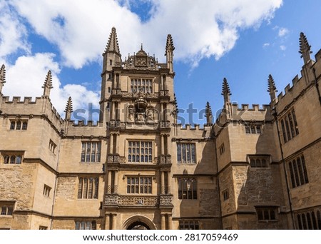 The Tower of the Five Orders, main gatehouse of the Bodleian Library's Old Schools Quadrangle, completed 1613–1620. Unique among English buildings, each of its five storeys displays a different classical order — Tuscan, Doric, Ionic, Corinthian and Composite — in ascending sequence. A bronze statue of James I by sculptor John Clark occupies a niche between the fourth and fifth storeys. The tower was commissioned by Sir Thomas Bodley and influenced by Sebastiano Serlio's architectural treatises, Oxford, England, United Kingdom.