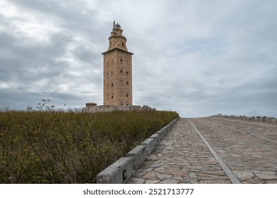 Tower of Hercules and Roman lighthouse in A Coruña, Spain on a very cloudy day - Powered by Shutterstock