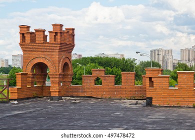 tower made of bricks on a building roof