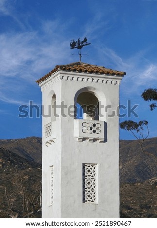 Tower of the old 1931 Montecito Firehouse in front of the fire scorched Santa Ynez mountains	