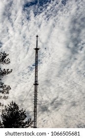 Tower on the background of the dramatic blessed night sky