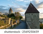 A tower on the old town walls of Romont in Switzerland taken at sunset