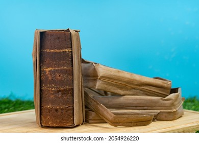 A tower of the palm sugar with dried coconut leaves used for packing. Selective focus points. Blurred background