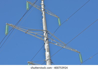 Tower power lines. Photo of towers of transmission lines against the blue sky.