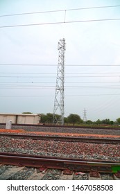 tower and railway track with sky