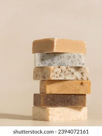 Tower stack of beige handmade soap bars on light beige close up. Natural hygiene products for body and skin care, minimal pastel composition