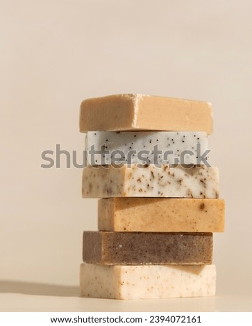 Similar – Image, Stock Photo Beige handmade soap bar on soap saver bag near hygiene Items top view