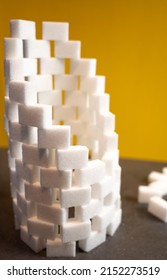 Tower Of White Sugar Cubes Half Collapsed