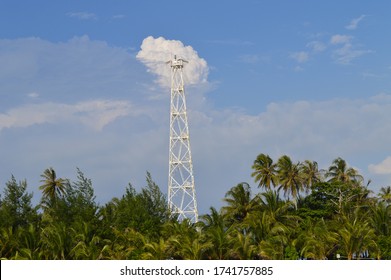 towering lighthouse on Tikus island