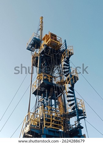 Towering strength and precision — a workover rig standing tall, ready to power energy operations