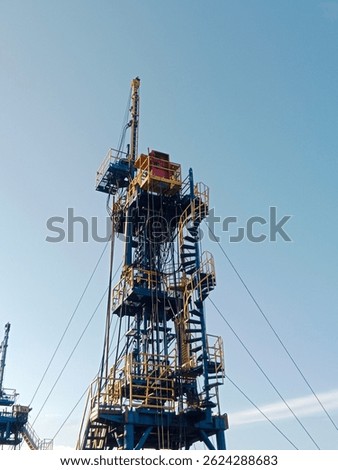 Towering strength and precision — a workover rig standing tall, ready to power energy operations