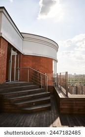A towering structure adorned with numerous windows and staircases that stretch towards the sky