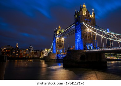 Towers of London, historical bridge of England illuminated in evening lights in London - UK