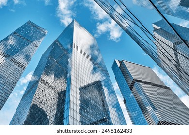 Towers and reflections of business district Moscow City, Moscow, Russia. Modern architecture, abstract background.