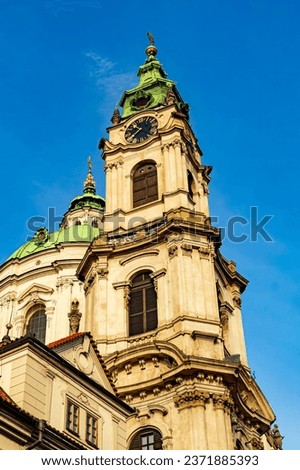 The Town Belfry by St. Nicholas Church. Prague street architecture. Views and sights of Czech republic. Was build in 1752, although the official recordings state 1755