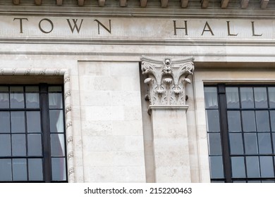 Town Hall Sign On White Stone Urban Building