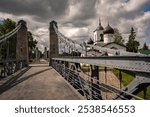 The town of Ostrov, Chain Bridge across the Velikaya River. Pskov Region, Russia.