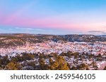 Town and snowy mountains at sunset in Creel Chihuahua