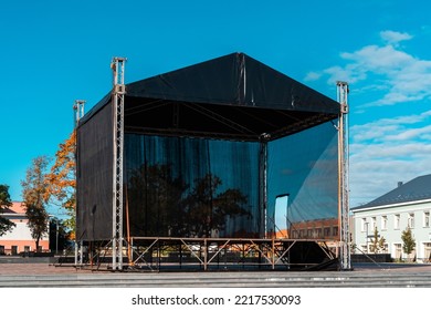 Town Square With A Concert Venue Stage. Empty Outdoor Concert Stage On A Sunny Autumn Day.