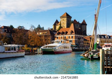 Townscape of Annecy, Haute-Savoie, France. View of Thiou river embankment and Annecy Castle.