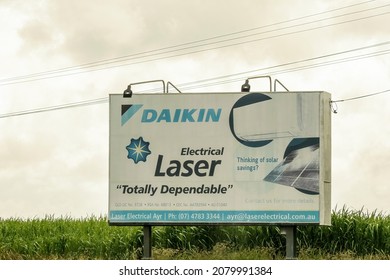 Townsville To Mackay Highway, Queensland, Australia - November 2021: Outdoor Highway Advertising Sign For An Electrical Business