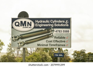 Townsville To Mackay Highway, Queensland, Australia - November 2021: Outdoor Highway Roadside Advertising Sign For A Local Business