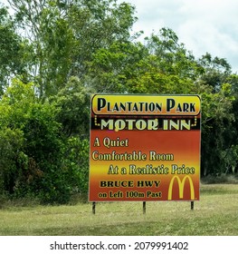 Townsville To Mackay Highway, Queensland, Australia - November 2021: Outdoor Highway Roadside Advertising Sign For A Local Business