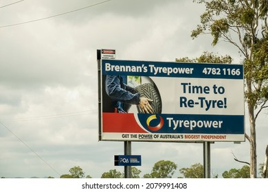 Townsville To Mackay Highway, Queensland, Australia - November 2021: Outdoor Highway Roadside Advertising Sign For A Local Business