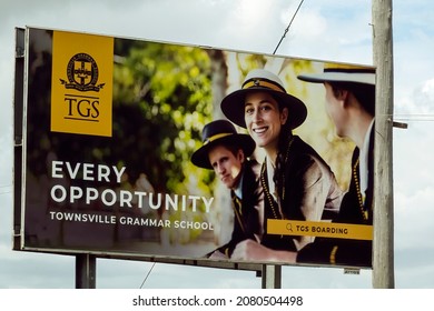 Townsville To Mackay Highway, Queensland, Australia - November 2021: Outdoor Highway Roadside Advertising Sign For A Local Business