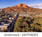 Townsville, Queensland, Australia: Aerial view of Castle Hill, the dramatic red granite outcrop overlooking the city of Townsville.