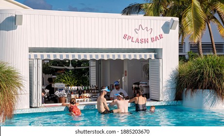 Townsville, Queensland, Australia - December 2020: Guests Ordering Drinks At Swim Up Bar At Casino Hotel